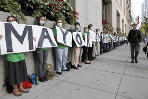 Grassroots people power pressure company and Chicago officials to retire coal plants